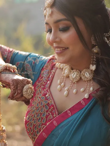 A candid shot of my Haldi bride, showing off her beautiful jewelry and makeup. The look is designed to be radiant and picture-perfect from every angle.
