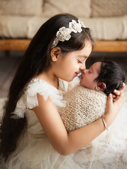The sweetest kiss for a new baby brother. Capturing the beginning of a lifelong bond between siblings is one of the most rewarding parts of my job.