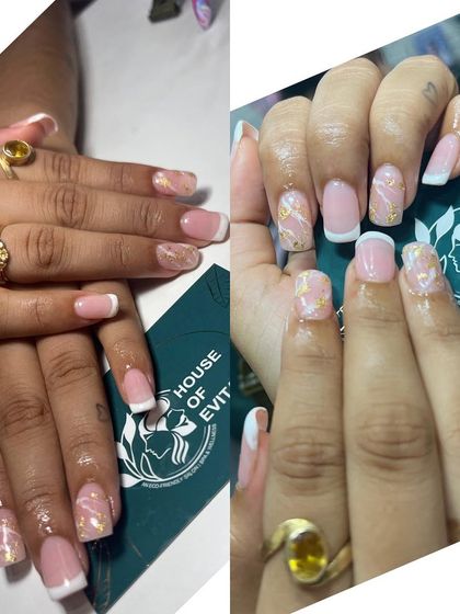 For a more luxurious feel, I added gold foil accents to this classic French manicure. The combination of the clean white tip and the sparkle of gold creates a truly elegant design.