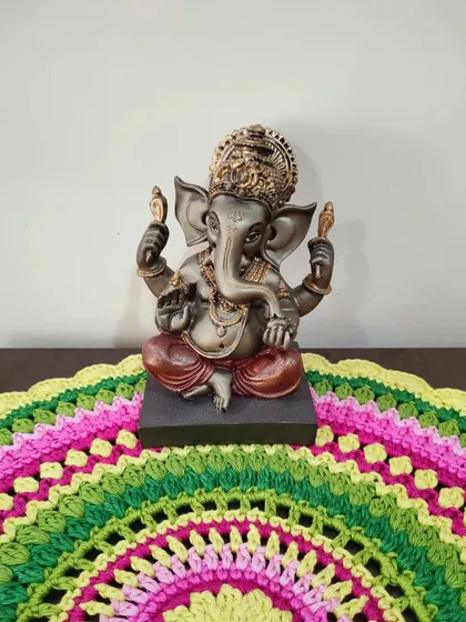A closer view of the Ganesha statue on the mandala.