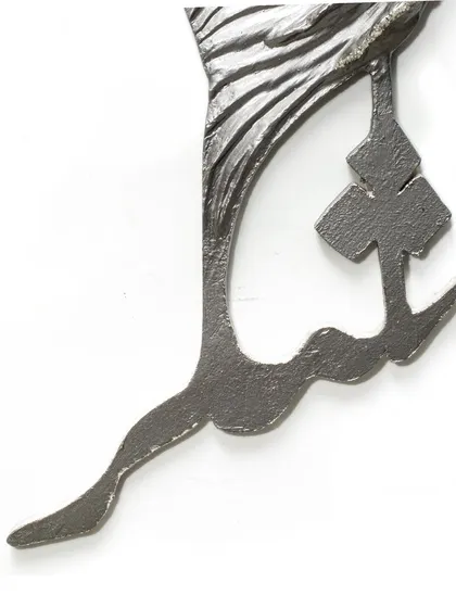 A detail of the Arabic calligraphy integrated into the "Eternal Horse" sculpture, rooting the piece in its cultural heritage.