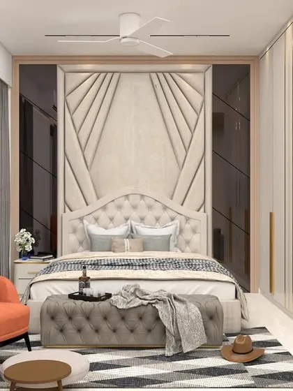 Another view of the monochromatic bedroom, focusing on the seating area and vanity. The design ensures that every part of the room is both functional and aesthetically pleasing.