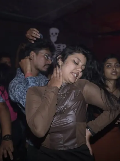 The dance floor was packed for the Halloween party. Everyone was dressed up and ready to dance.