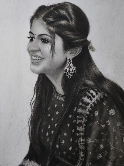A beautiful portrait of a young woman, where I focused on the intricate details of her traditional earrings and the soft texture of her hair.