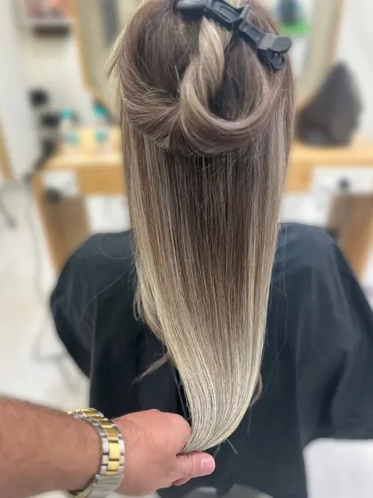The secret to a perfect blend is in the details. This shot, taken right before styling, shows the clean, precise lines of my balayage application. This level of detail is what creates a natural, seamless grow-out with no harsh lines.