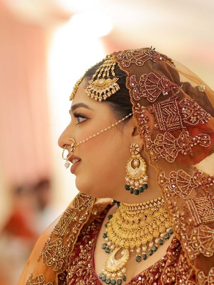 A side profile of my Sikh bride, showing the beautiful details of her Passa and the soft glam makeup.