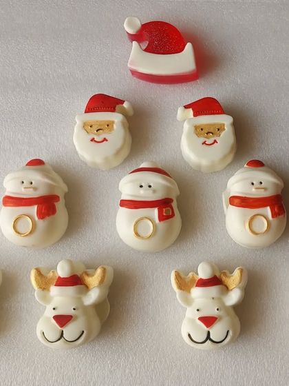 My hand-painted Christmas element soaps, featuring Santa, snowmen, and reindeer. These are made to order and make a perfect Secret Santa gift.