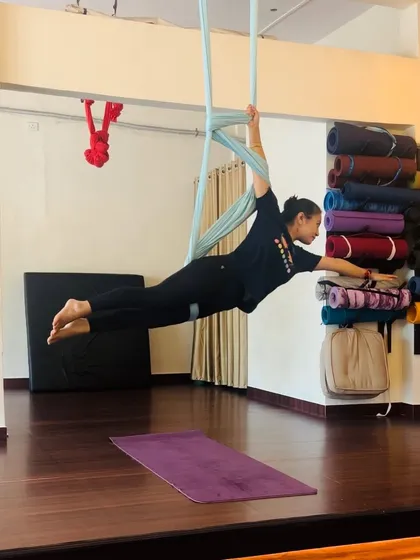 This is what it feels like to fly. This pose requires core engagement and shoulder stability, building strength in a way that feels more like soaring and less like a workout.