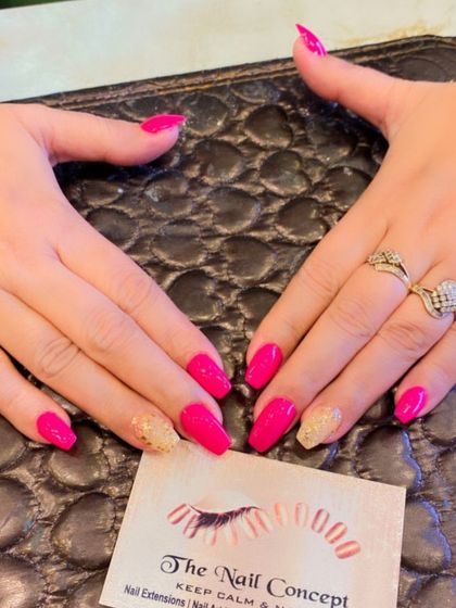 A vibrant hot pink set with gold glitter accent nails. This combination is perfect for parties, festivals, or any time you want your nails to pop.
