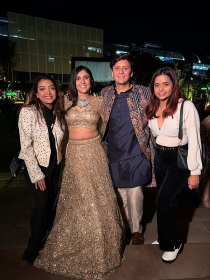 A happy picture with the couple who proved that dedication changes everything. They went from being nervous to performing with confidence and grace.