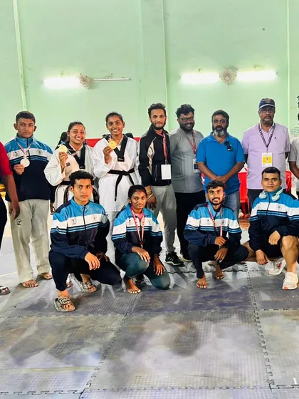 The team and coaching staff at the Dasara CM Cup. We believe in coaching our students through every phase of the competition, from preparation to performance.