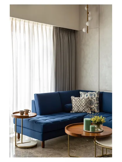 The bold blue sofa from 'Top Floor Retreat' stands out in this compilation. It shows our confidence in using strong colors to define a space and reflect a client's personality.