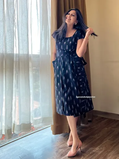 Meet the pinafore dress, my modern take on a classic. Crafted from pure handloom Ikat, it's a versatile piece that you can style for a day at the office or a casual coffee date.