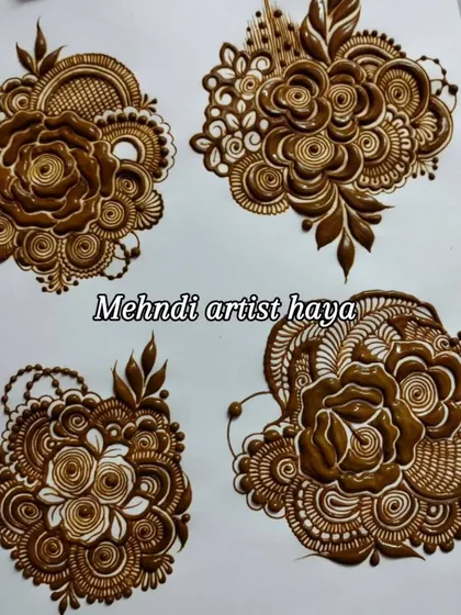 A collection of four intricate floral clusters. These are more than just single flowers; they are small compositions that can be used as the main element in a party henna design.