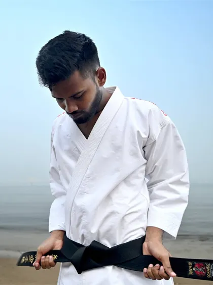 The black belt is not an end, but a beginning. It represents countless hours of dedication, perseverance, and a deep commitment to the martial arts journey. It is a symbol of the character we strive to build in every student.