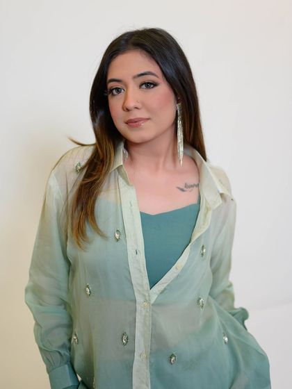 A portfolio shoot for a contemporary clothing brand. I created a modern, minimalist makeup look with a focus on a smudged liner and dewy skin.