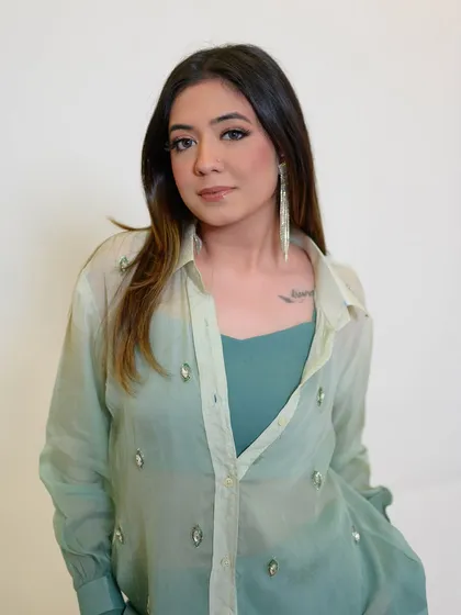 A portfolio shoot for a contemporary clothing brand. I created a modern, minimalist makeup look with a focus on a smudged liner and dewy skin.
