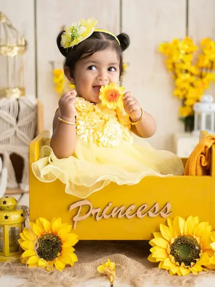 We love bringing vibrant ideas to life. This sunflower-themed first birthday shoot shows how we use color, props, and lighting to create a bright, happy, and unforgettable portrait.