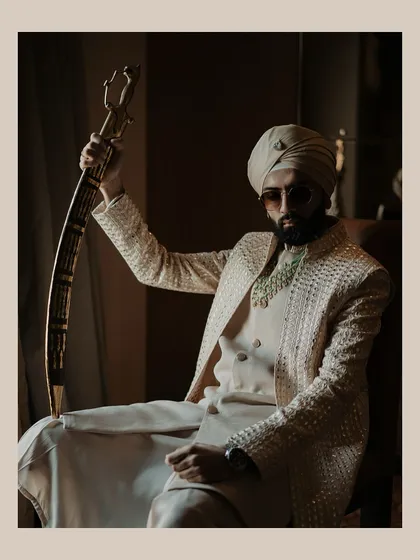 The groom's story is one of quiet strength and regal elegance. We craft powerful, cinematic portraits that capture his personality, from the traditional details of his attire to the confident look in his eyes.