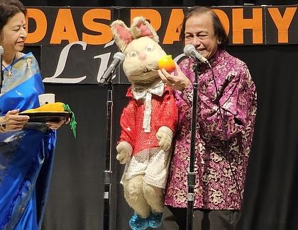 My parents, Ramdas and Aparna Padhye, performing with Bunny the Funny during our USA tour. Their chemistry on stage is timeless.