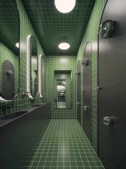 A public washroom concept rendered with a monolithic feel. The floor-to-ceiling green grid tiles and minimalist black fixtures create a bold, modern, and uniform aesthetic.