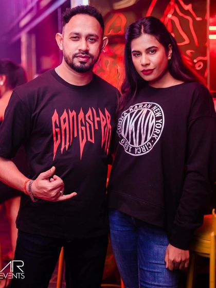 A couple posing for a photo.