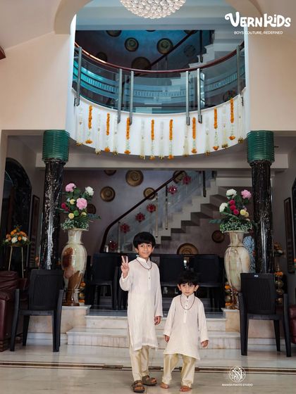 When your custom-made outfits are soft and unique, twinning becomes next-level cute. Just look at these brothers in their matching white kurtas, pure Vern Kids magic.