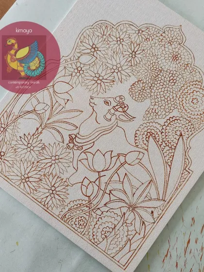 The detailed brown outline of the showstopper Pichwai Cow painting. The intricate floral background and the serene cow are all carefully drawn, ready for color.