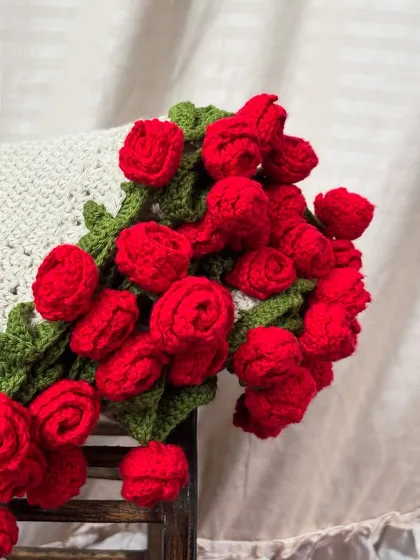 A closer look at the details of our 'Rose Vine' blanket. Each rose is carefully crocheted and attached to create a stunning three-dimensional effect that looks just like a real bouquet.