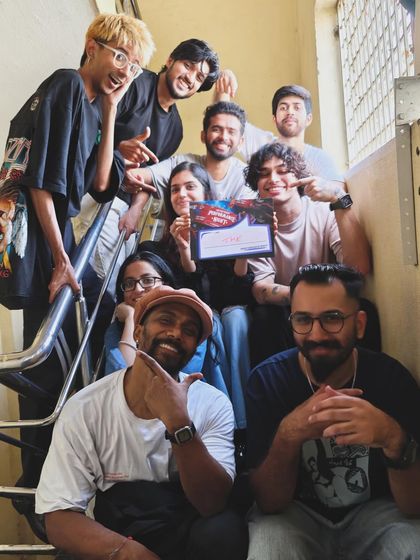 The crew is ready. A quick group photo backstage captures the camaraderie and shared excitement before the show begins.
