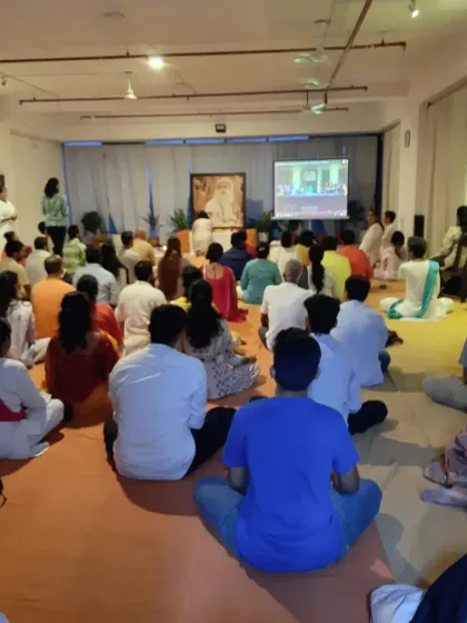 "When you surrender, He invades." A moment of deep stillness and receptivity during our Guru Purnima gathering at the AumTara studio.