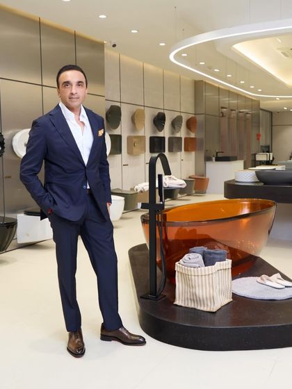 A professional portrait of the brand head, Chirag Parekh, within the new showroom. We provide corporate headshots and environmental portraits during the event coverage.