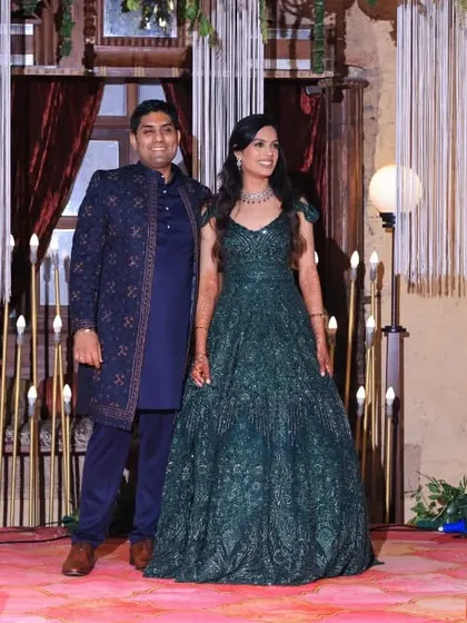 Interacting with the couple during their Sangeet, ensuring they are having the time of their lives on their special night.