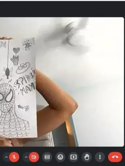 A Spiderman fan showing off his amazing doodle page. I encourage kids to draw what they love, even in our online classes.