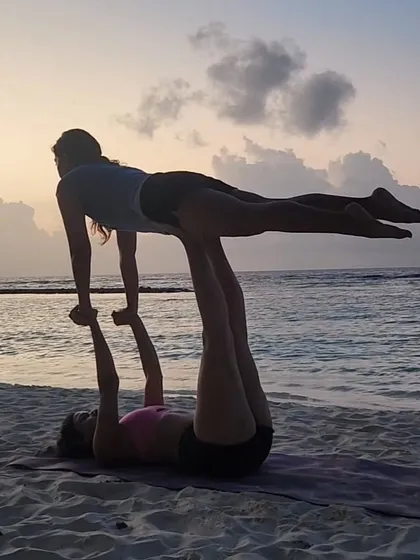 Playfulness is a huge part of our practice. This sunset acro yoga session was all about teamwork, trust, and a lot of laughter as we created shapes against the beautiful evening sky.