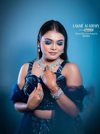 A close-up on a blue smokey eye, a classic cocktail party look. Our students learn to blend dark colors seamlessly for a dramatic yet clean finish.