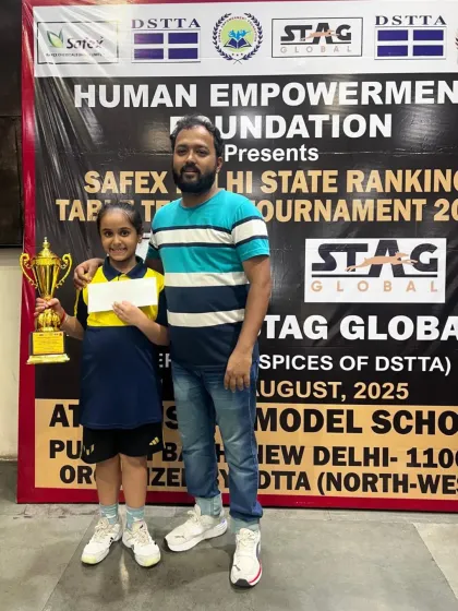 Our U-9 player Ikaara Sreeram celebrates her Bronze Medal win. Her performance highlights the success of our coaching programs for young beginners.