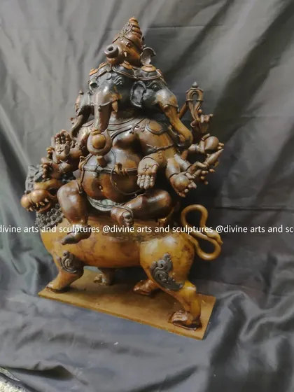 A final look at the Heramba Ganapati wax model, a form of Ganesha known as the protector of the weak. The entire composition is reviewed for perfection before casting.
