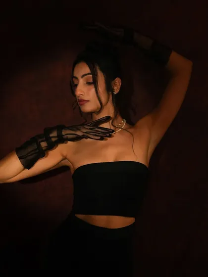 A duplicate of image 27, showcasing the dramatic and elegant pose.