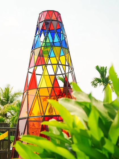 Recreating the iconic Coachella "Spectra" tower with colorful acrylic panels. This 20-foot structure served as the central art installation and a fantastic photo opportunity for the festival-themed Haldi.