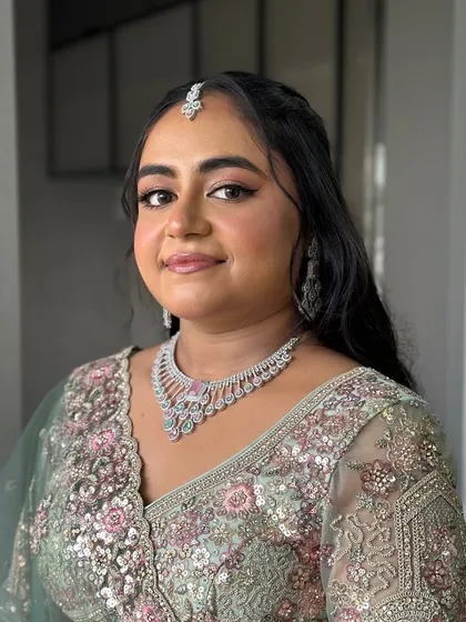 A beautiful close-up of the engagement makeup. This unfiltered shot shows the true texture of the skin and the seamless blend of the makeup. She looks flawless!