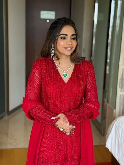 A happy and confident portrait of the bride, ready to celebrate her Roka.