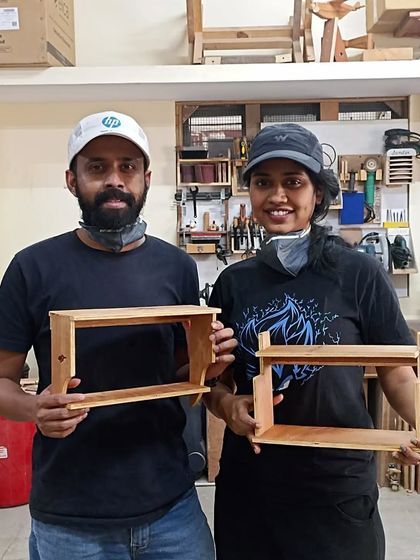 Here are Arjun and Ann with the small shelves they also built during their workshop. This project is great for learning how to create strong dado and rabbet joints.