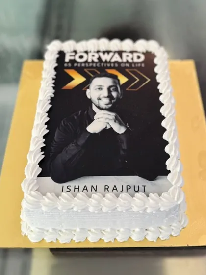 A custom photo cake is perfect for a book launch or personal branding event. This cake features an edible print of the author and his book cover, creating a unique and shareable moment for the celebration.