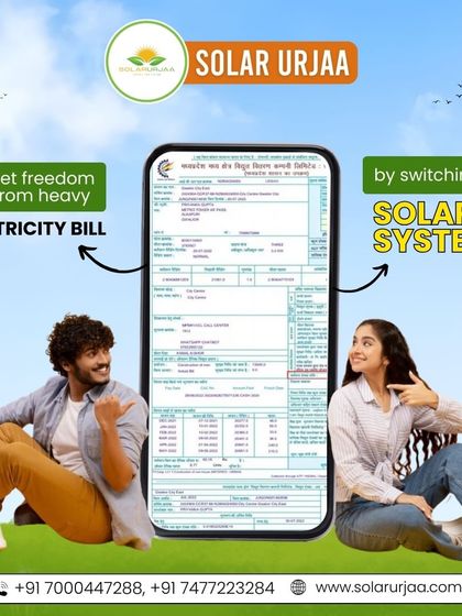 **Get freedom from heavy electricity bills by switching to a solar system.** This image shows a happy couple pointing to their solution. You can have this peace of mind too.