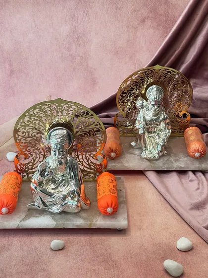 My collection of divine idols on natural stone bases offers a unique blend of spiritual art and earthly beauty. Here, idols of Guru Nanak and Lord Hanuman are presented with equal reverence, perfect for a multi-faith home.