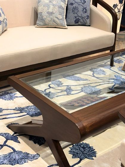 A close-up of our custom sofa and coffee table from the Design Democracy collaboration. The clean lines of the furniture are softened by the rich, handwoven textiles.