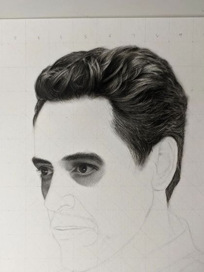 Another progress shot of the Robert Downey Jr. sketch. At this stage, I've started blocking in the dark values around the eyes, establishing the deep-set look that is crucial for capturing his likeness.