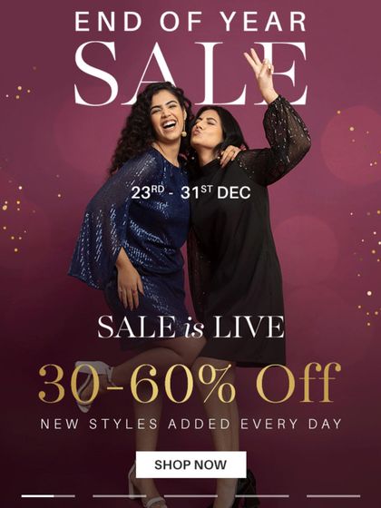 A lively shot with a co-model for a Fable Street sale announcement. This image captures the excitement of a sale event and is perfect for social media and website banners.