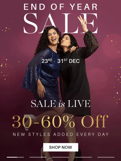 A lively shot with a co-model for a Fable Street sale announcement. This image captures the excitement of a sale event and is perfect for social media and website banners.